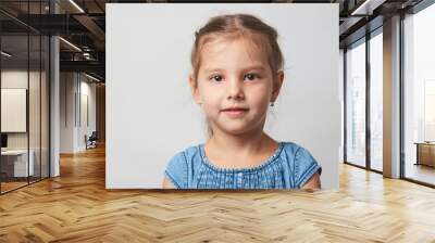 Happy child girl portrait on a white background with copy space Wall mural