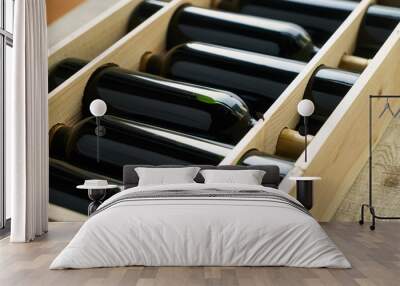 Top view of a case of cabernet sauvignon wine bottles. Wooden box with collection of six wine bottle Wall mural