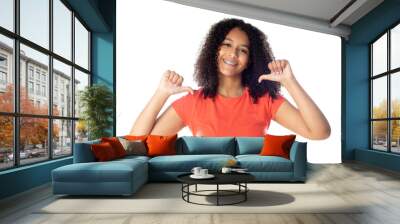 Close up of smiling little african american kid girl wearing red t-shirt looking at camera isolated on a white background Wall mural