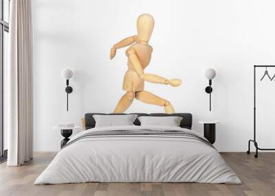 Jointed wooden mannequin running Wall mural