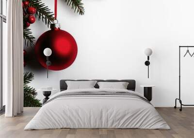 A festive Christmas scene featuring a red ornament and pine branches, perfect for holiday decorations and seasonal celebrations. Wall mural