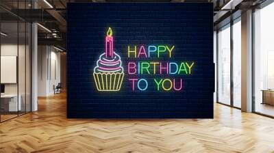 glowing neon sign of happy birthday card with cake and candle. birthday cake celebration symbol in n Wall mural