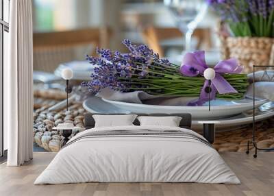 An elegant summer table setting featuring a white plate grey linen napkin and fresh lavender sprigs tied with a purple ribbon all presented on a woven placemat : Generative AI Wall mural