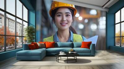 Asian woman engineer holding document smiling at construction site Confident female Indian wearing protective helmet and vest working in factory making precast concrete wall for real e : Generative AI Wall mural