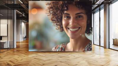 Attractive young curly shorthaired woman in floral dress smiles and looks into camera Portrait of fashion designer in office : Generative AI Wall mural