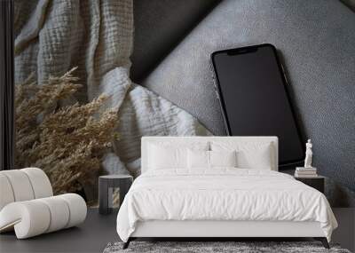 Blank screen mobile phone with copy space on sofa Flat lay top view Copy space mockup template High quality photo : Generative AI Wall mural