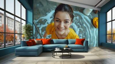 Caucasian smiling young woman cleaning kitchen floor with wet mop at home copy space unaltered hygiene bucket and lifestyle concept : Generative AI Wall mural