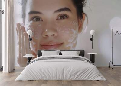 Close up portrait of beautiful woman clean her skin with cleansing gel washing face and smiling from pleasure standing over white background : Generative AI Wall mural