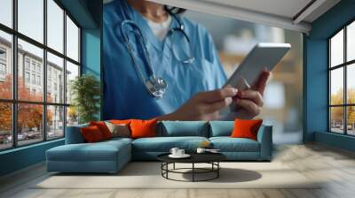 Closeup of nurse using a tablet at clinic reading a patient report while wearing blue scrubs and stethoscope Caucasian female physician holding digital device for medical research : Generative AI Wall mural