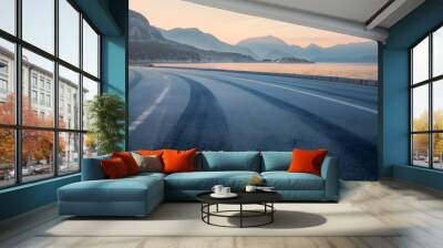 Empty asphalt road by the sea Road and mountain with sea at sunset : Generative AI Wall mural