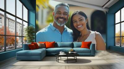 Happy diverse couple bought their new home and standing in front of it and showing keys Copy space Real estate owners Hispanic woman and african american man posing in front of the hou : Generative AI Wall mural