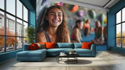 Laughing young woman in sportswear sitting with other people on the floor of a bouldering gym after a rock climbing session : Generative AI Wall mural