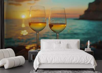 Romantic outdoor evening with two glasses of white wine and beautiful sunset on the sea beach at background Italy Sicily evening time summer : Generative AI Wall mural