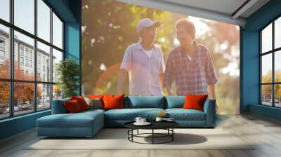 senior father with adult son in family concept banner background with copy space elderly old man person are happy and enjoy with hipster son together by walking outdoor in nature : Generative AI Wall mural