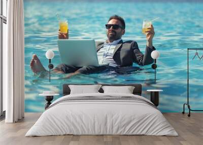 Summer vacations and freedom travel concept Portrait of funny business man on the beach Businessman in suit floating with laptop and cocktail in pool Crazy business man dreams on summe : Generative AI Wall mural