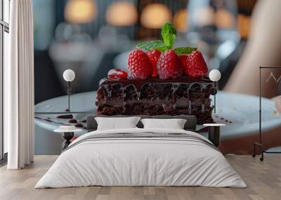 Sweet treat with a rich chocolate cake topped with fresh strawberries Woman hand take a chocolate candy from plate Luxury restaurant with delicious food : Generative AI Wall mural