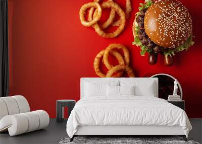 Tasty burger French fries hot dog fried onion rings and refreshing drink on red background flat lay Fast food : Generative AI Wall mural