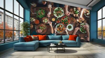 Top view of vegan friends gathering around wooden table chatting lively and eating bio organic food : Generative AI Wall mural