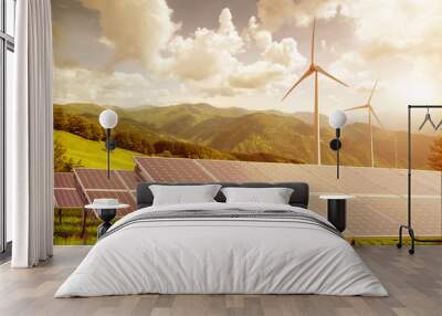 solar panels and wind turbines against mountanis landscape again Wall mural