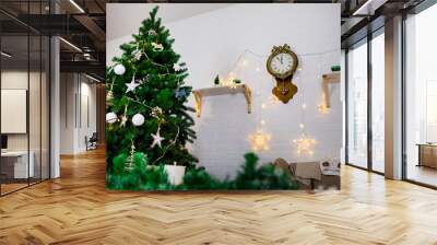 Christmas and New Year photo studio, green tree, garlands stars, clock on a white wall (6). Idea for holiday like Christmas and New year, for covers books, magazines, articles.
 Wall mural