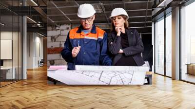 Business woman in builder helmet . Wall mural