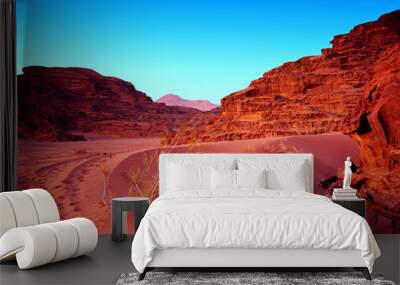 Sunset in desert with sand and mountain. Landscape. Wall mural