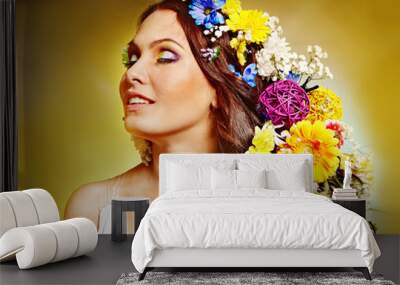 Woman  with flower hairstyle. Wall mural