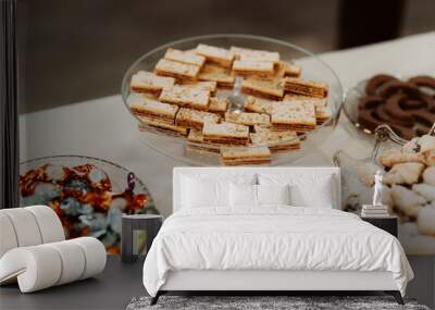 Closeup of dessert foods on a table Wall mural