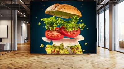 Exploded vegetarian sandwich with guacamole and tofu on blue Wall mural