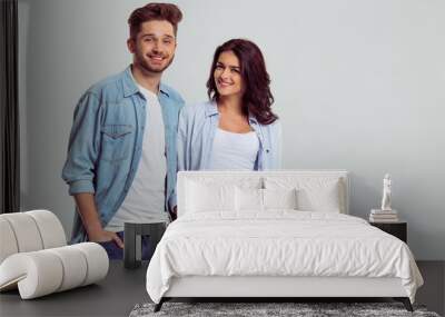 beautiful young couple in jeans Wall mural