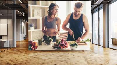 Couple cooking healthy food Wall mural