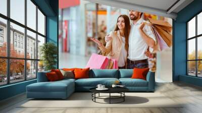 Couple doing shopping Wall mural