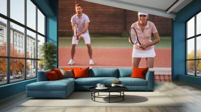 Couple playing tennis Wall mural