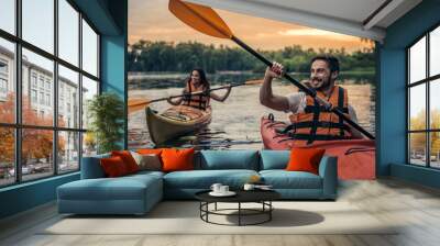 Couple travelling by kayak Wall mural