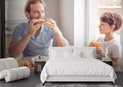 Father and son in kitchen Wall mural