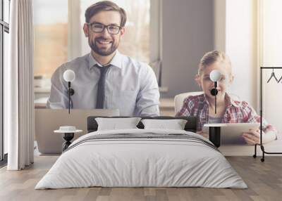 Handsome businessman and his daughter Wall mural