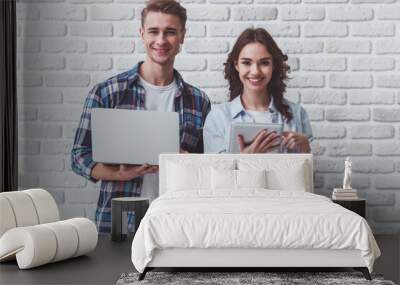 Young couple in the studio Wall mural