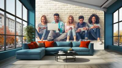 Young people with gadgets Wall mural