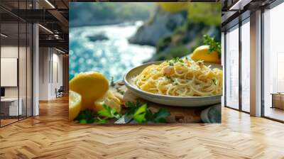 bright summer terrace overlooking the sea and rocky coast. wooden table with a plate of seafood spag Wall mural