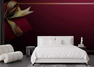 Elegant burgundy card with two gold ribbons and luxurious gift box for festive occasions Wall mural