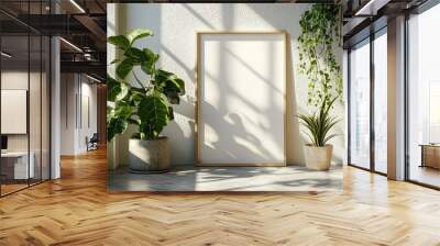 Minimalist mockup of an empty vertical frame surrounded by lush green houseplants in natural sunlight Wall mural