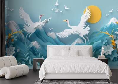 Serene landscape of two white cranes in a vibrant sunset scene with mountains Wall mural