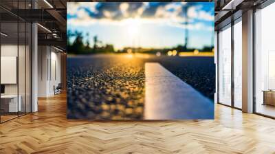 Sunset after rain, the empty highway. Close up view from the level of the solid line Wall mural