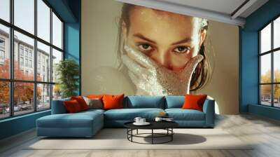 Silver sparkling party make up, young girl with glittering body art cover her face posing in studio Wall mural