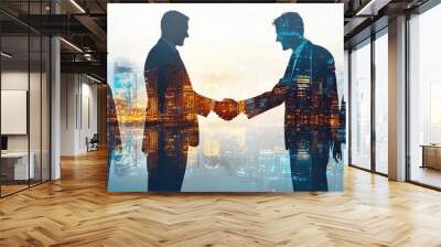 Two business people shaking hands with a cityscape overlay, symbolizing partnership and teamwork in a corporate setting. Wall mural