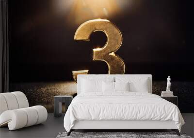 Shiny Gold Number Three on Dark Background Wall mural