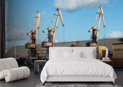 Cranes and ships in a cargo port Wall mural