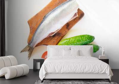 Norwegian herring on a board on a white table

 Wall mural