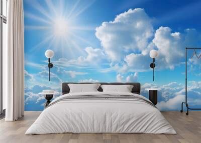 Closeup of cloudy sky with white clouds in blue heaven with shining sun Wall mural