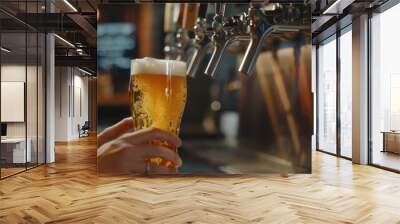 Fresh glass of beer in a bar, cold drink with alcohol in a pub or restaurant Wall mural